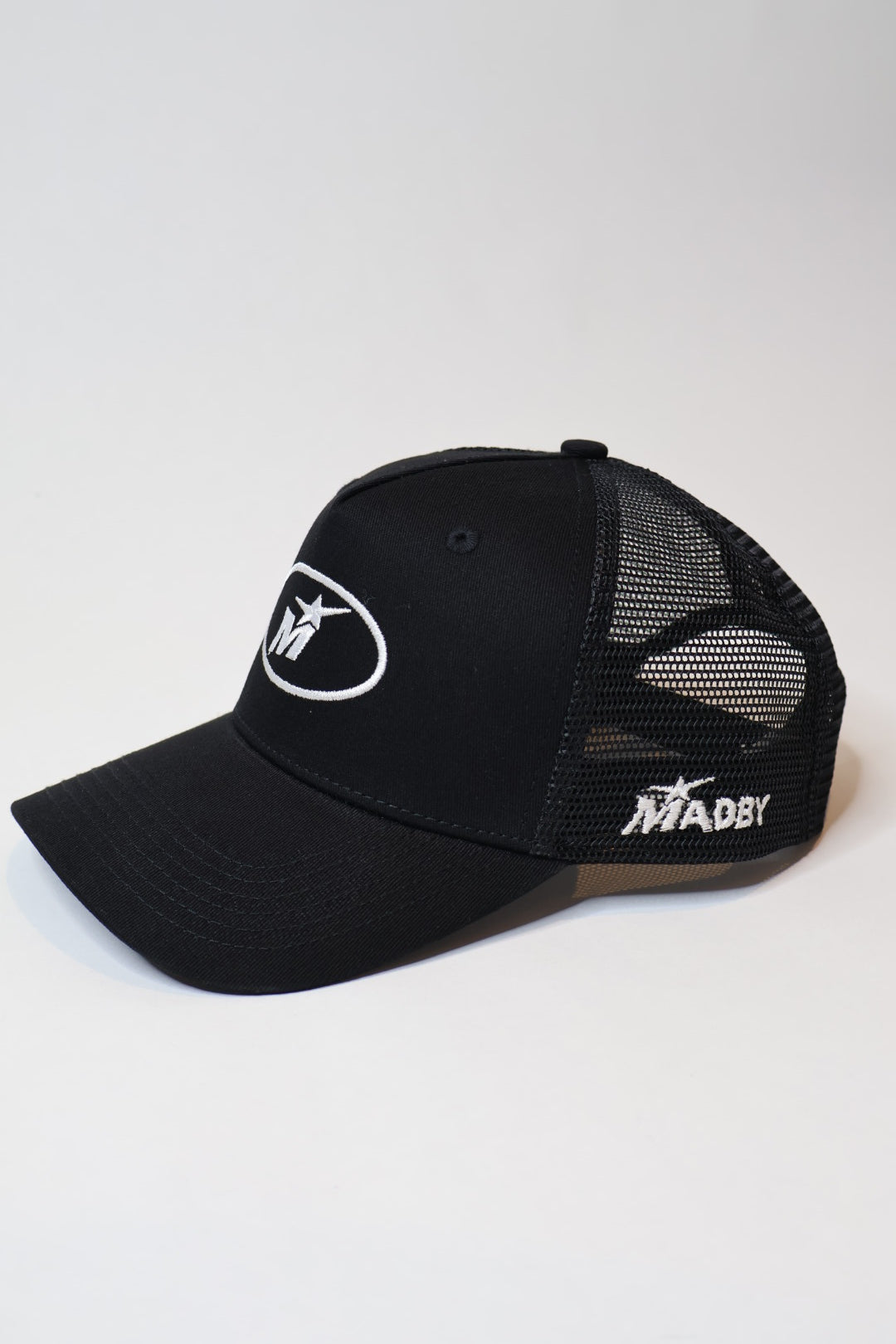Black trucker cap