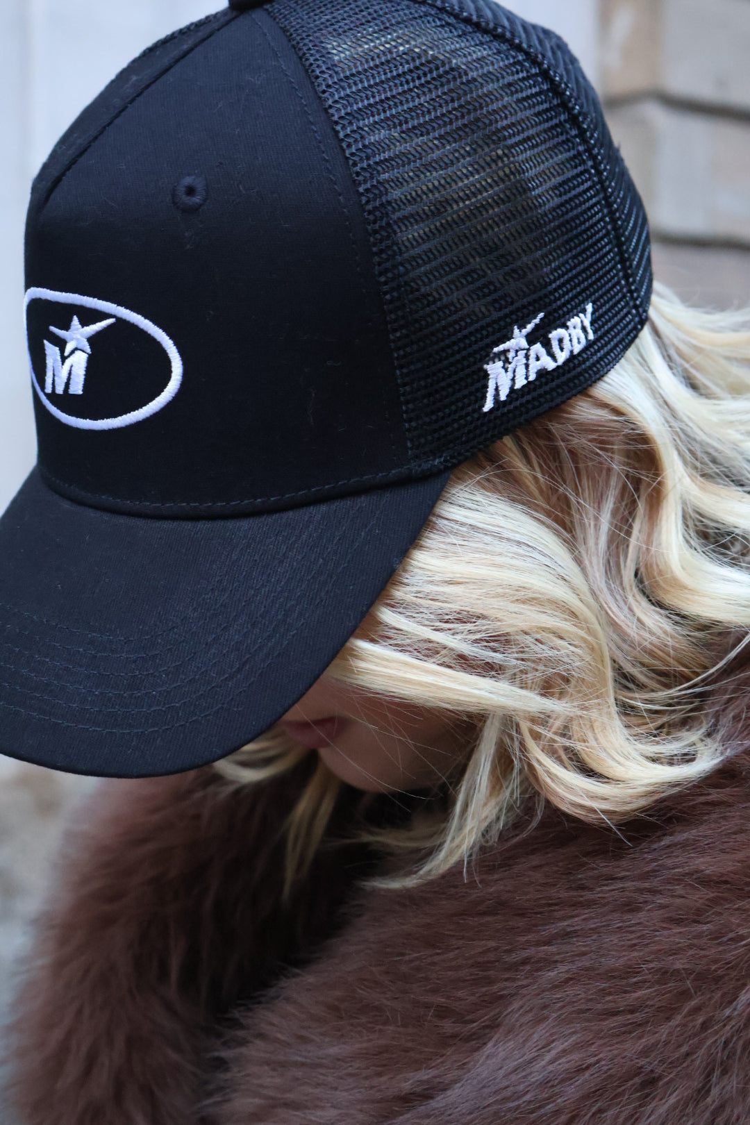 Black trucker cap