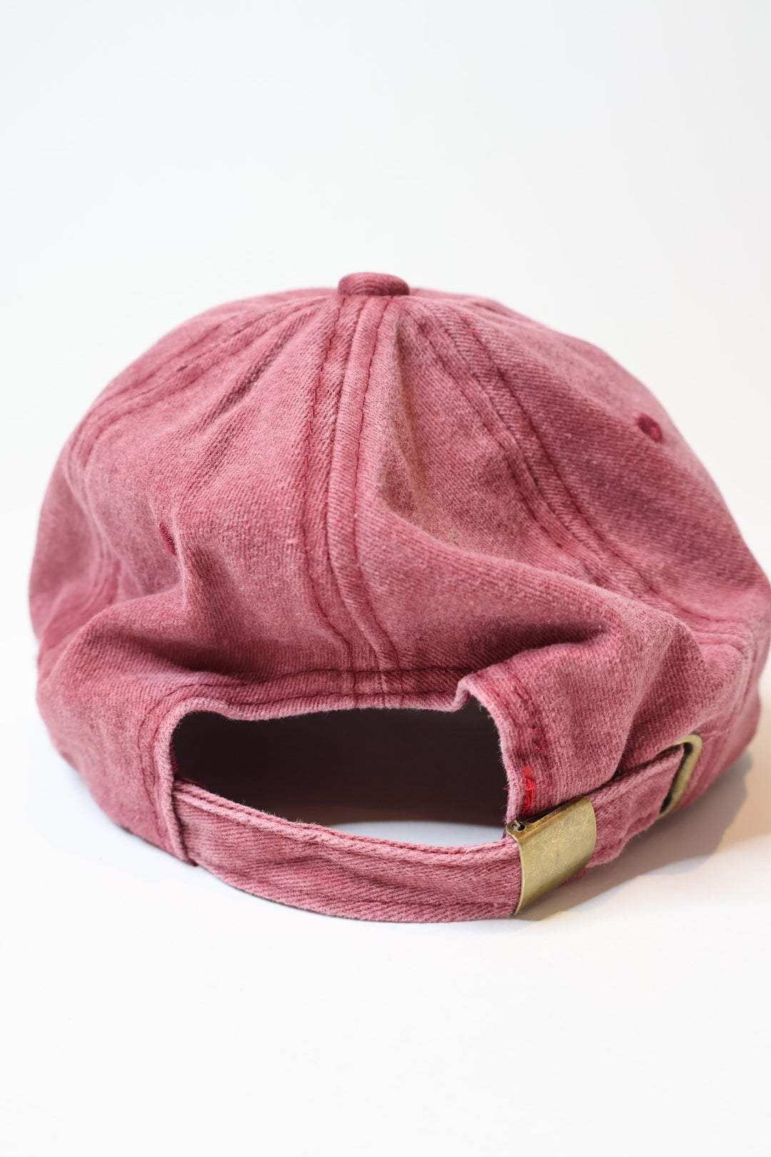 Faded burgundy red baseball cap