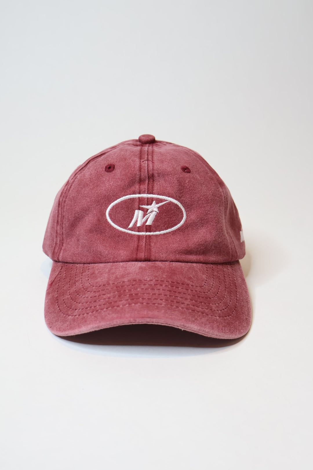 Faded burgundy red baseball cap